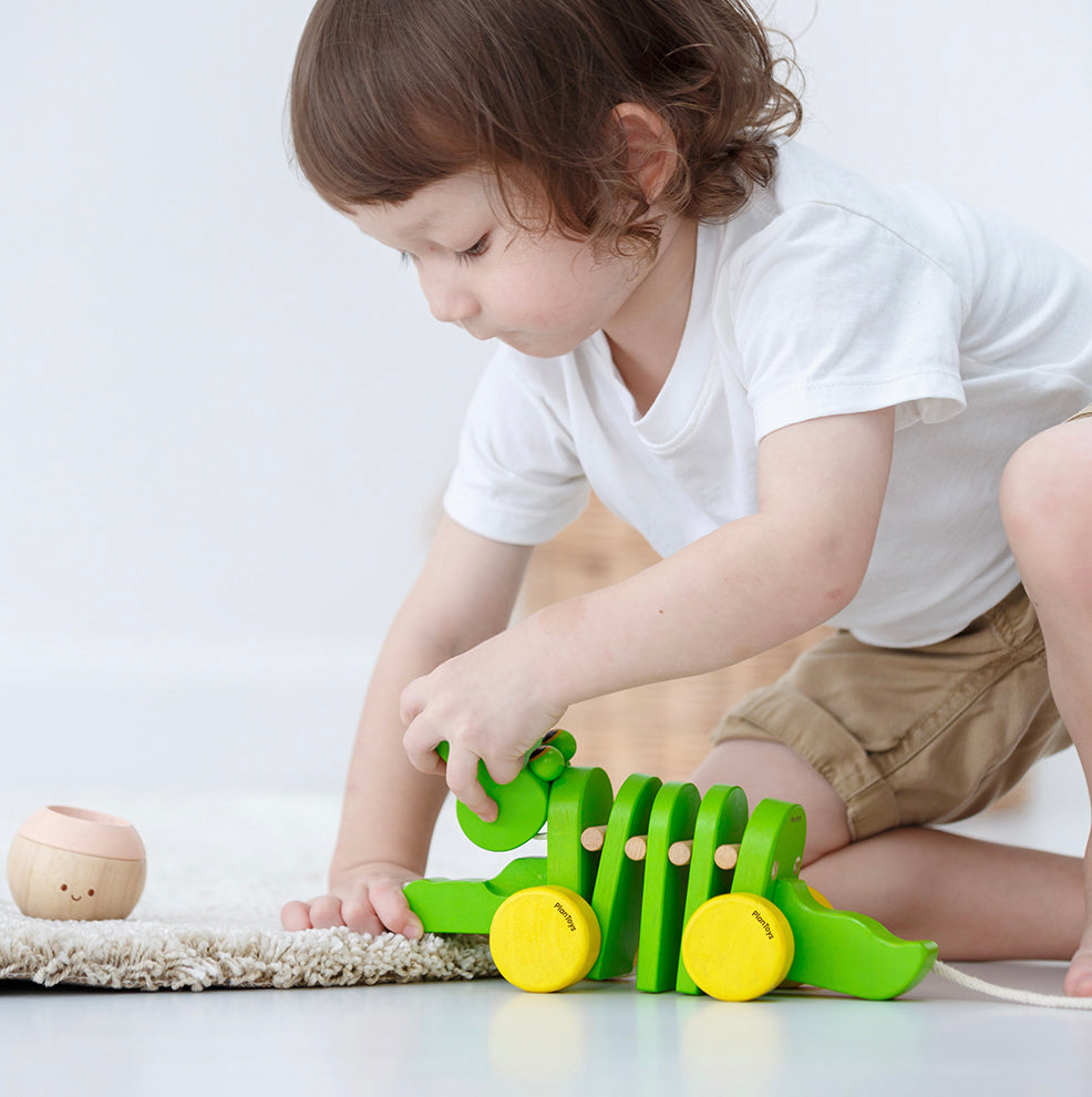 Dansende Krokodil Loopfiguur Plan Toys duurzaam speelgoed